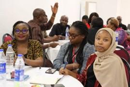Cross section of staff deliberating during the last pause, review, and reflection meeting January 2023. Photo Credit: GAIN