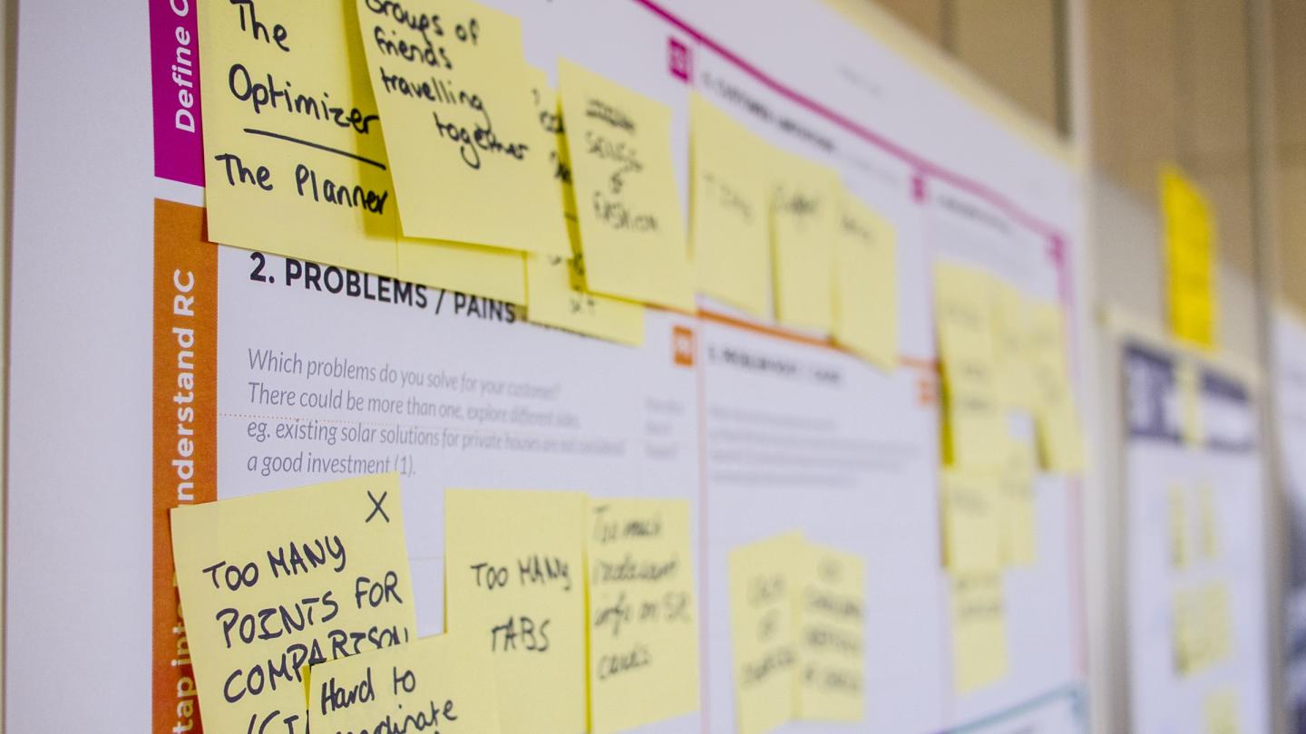 Image of wall planner with sticky notes. Photo credit: Daria Nepriakhina