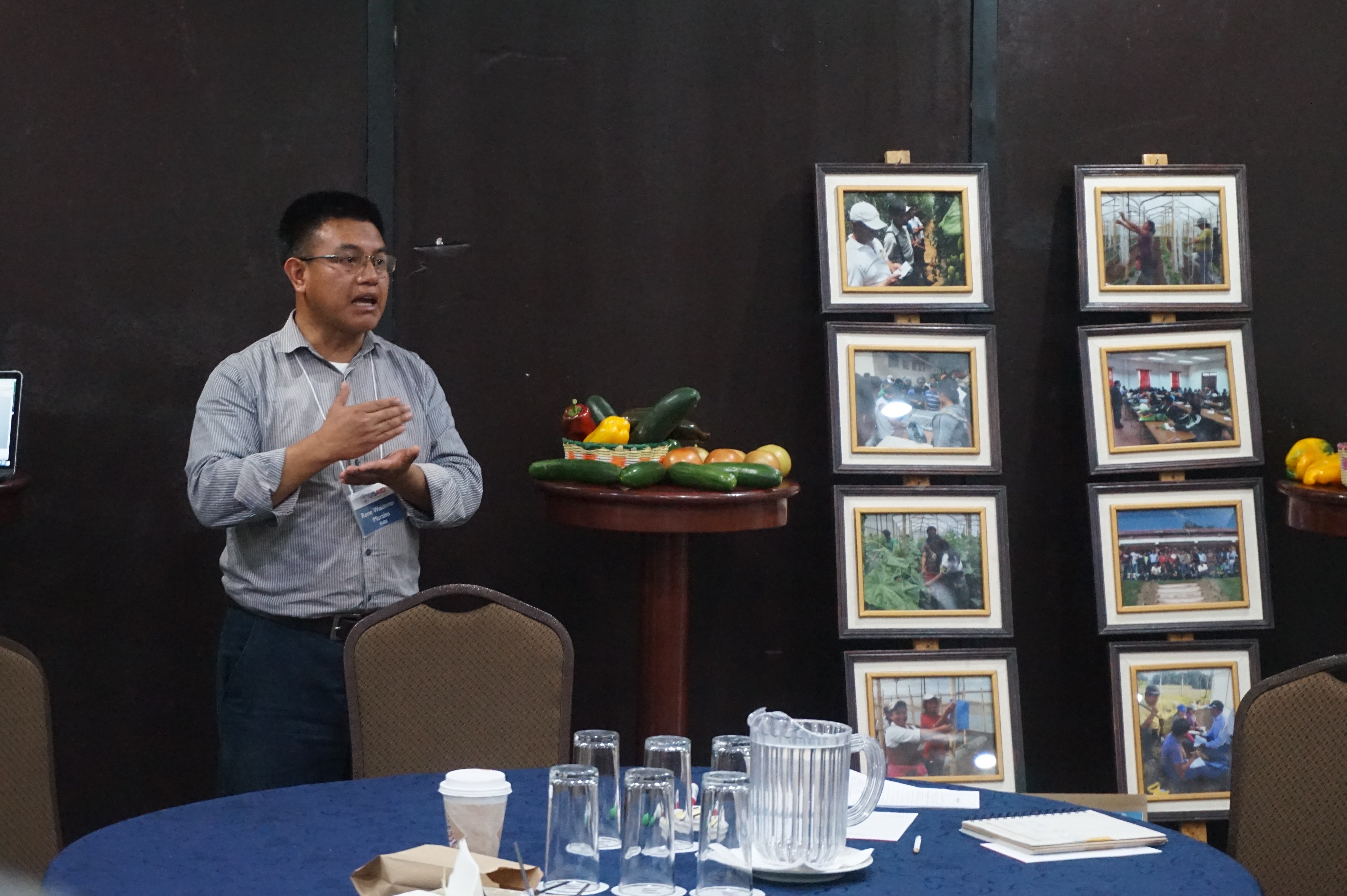 Image of man presenting information about his organization at the Guatemala BAA Co-Creation workshop