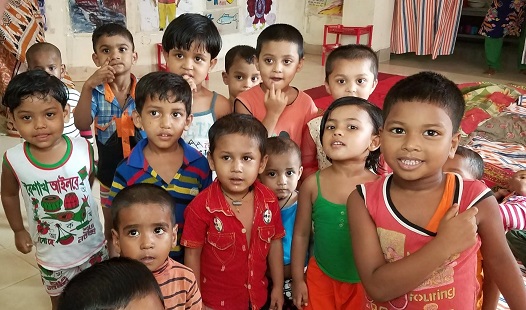 Children being cared for in the daycare of the Serina Garment Factory, Chittagong, Bangladesh/Sarah Swift, USAID.