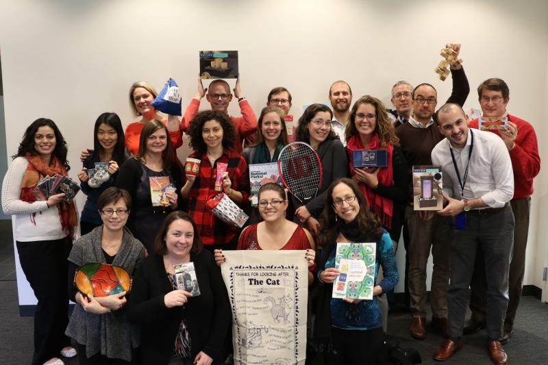Pictured: The LEARN Team posing with white elephant gifts during a holiday party. We resolve to continue to live our favorite team value: work hard, play hard. Photo credit: Megan Alt. 